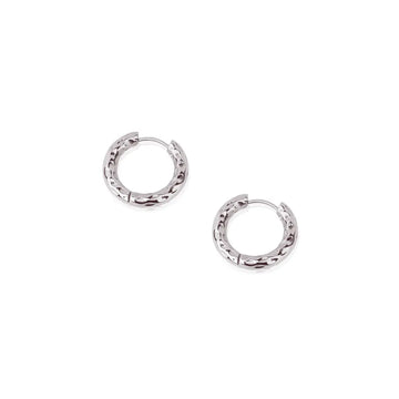 Natural textured hoop earrings – a tribute to rooted strength and earth-aligned design.
