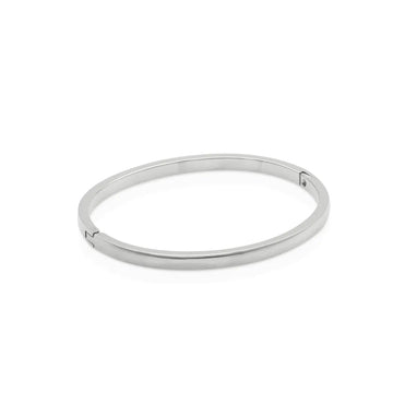 Minimalist silver bangle bracelet with a sleek, smooth finish – designed for movement, simplicity, and refined strength.