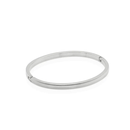 Minimalist silver bangle bracelet with a sleek, smooth finish – designed for movement, simplicity, and refined strength.