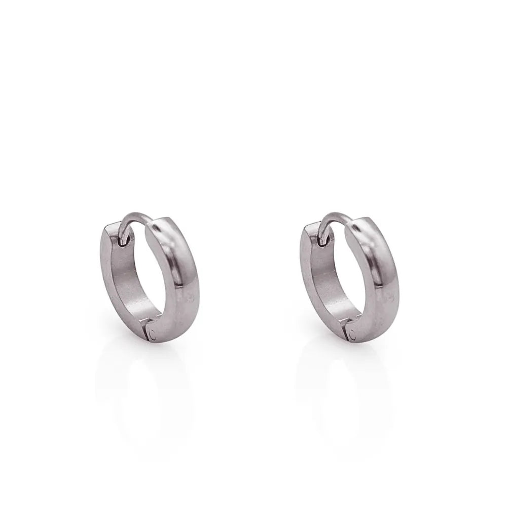 Polished silver Halo Mini hoop earrings – minimal and durable, crafted for movement and everyday styling.