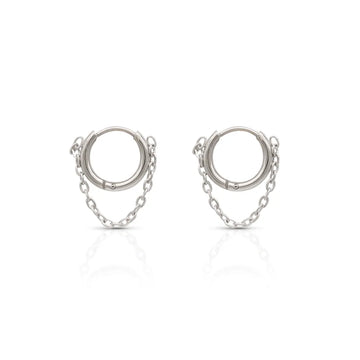 Hoop earrings with chain-link detail – embodying modern structure and fluid strength.