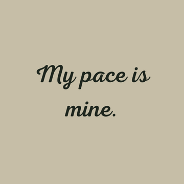 Empowering affirmation reading “My pace is mine.” in dark green cursive text on a muted beige background.