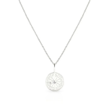 Engraved disc pendant featuring a starburst – designed to channel inner radiance.