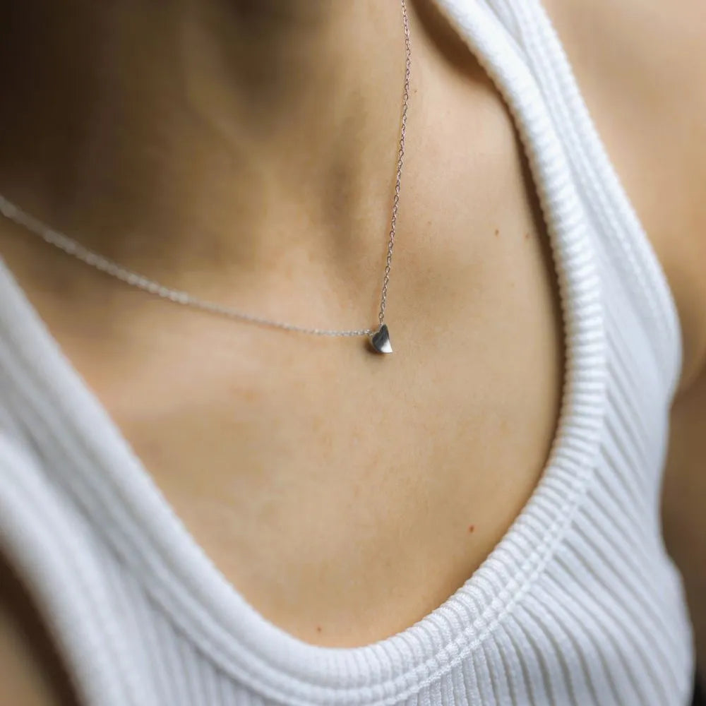Tiny heart-shaped pendant – soft and steady, crafted for daily expression.