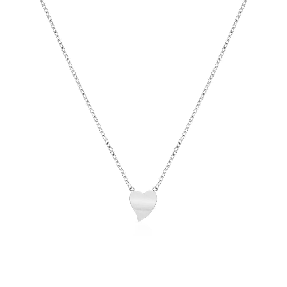 Tiny heart-shaped pendant – soft and steady, crafted for daily expression.