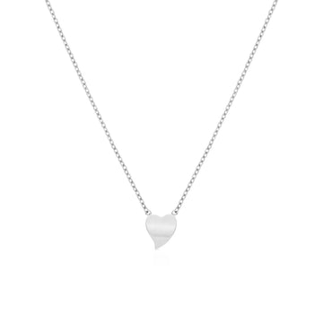 Tiny heart-shaped pendant – soft and steady, crafted for daily expression.