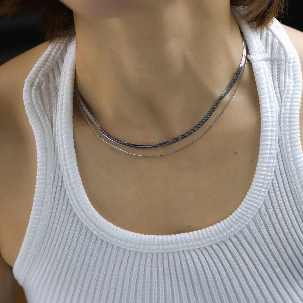 Dual-layer snake chain necklace – bold fluidity, reflecting power in grace.