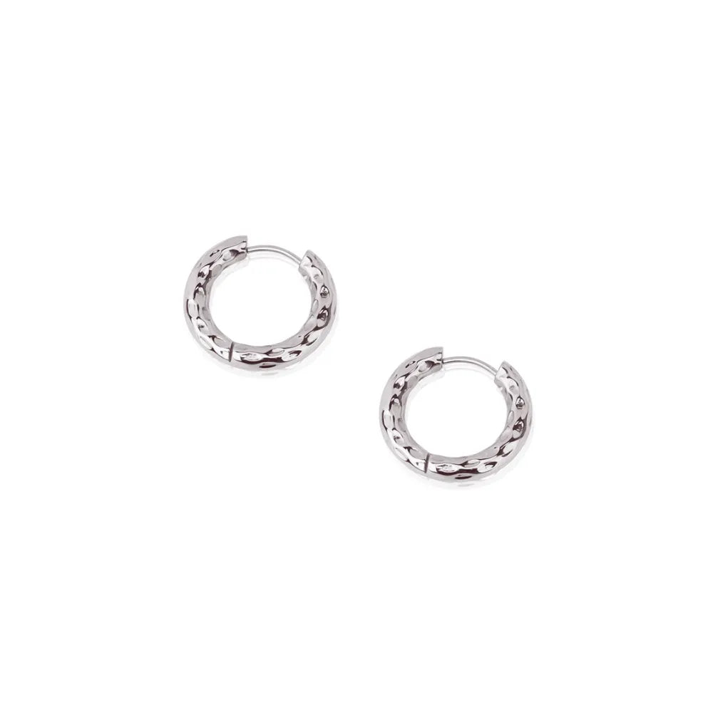 Natural textured hoop earrings – a tribute to rooted strength and earth-aligned design.